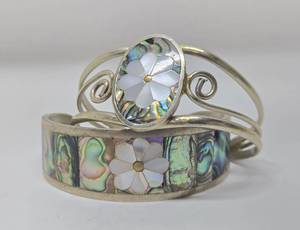 lot 202 image: 2 Vintage Southwestern Alpaca Mother of Pearl &amp Abalone Cuff Bracelets
