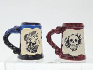 lot 379 image: 2 Vintage Azul Pottery Skull Mugs or Tankards