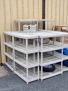 lot 396 image: LARGE Lot of Good Hard Plastic Shelving Units&nbsp