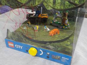 lot 37 image: LEGO City Jungle Rotating Explorer ...