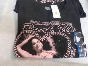 lot 80 image: 2 Selena Gomez T-shirts size Large...