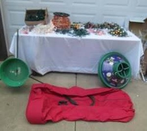 Lot of Christmas Decorating Items9 ft. lighted Xmas Tree in box, Christmas tree stands, Storage bag and many lighting cords