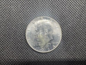 lot 40 image: BU 1964 90% Silver Kennedy Half Dollar