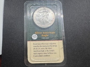 lot 55 image: 2000 Uncirculated American Silver Eagle in sealed Littleton holder