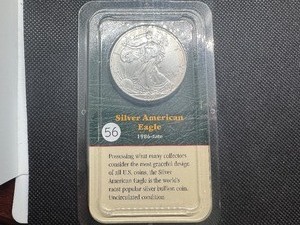 lot 56 image: 2000 Uncirculated American Silver Eagle in sealed Littleton  holder