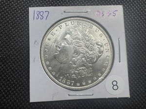 lot 8 image: 1887 Morgan Silver Dollar Marked MS65 When Purchased - Nice Mint Luster
