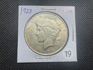 lot 19 image: 1923 Peace Silver Dollar Marked MS64 When Purchased