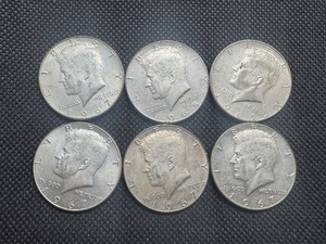 lot 36 image: Six 40% Silver Kennedy Half Dollars