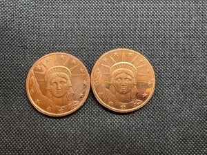 lot 99 image: Two Copper One Ounce Rounds Liberty Design