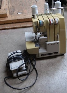 lot 74 image: SINGER ULTALOCK 14U52A SEWING MACHINE
