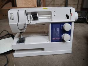 lot 79 image: HUSQVARNA MODEL 310 SEWING MACHINE