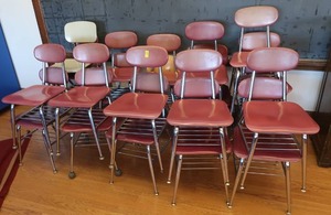 lot 149 image: 21 RED SCHOOL CHAIRS AND 4 ODD CHAIRS