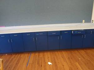 lot 399 image: LONG COUNTER TOP WITH CABINETS