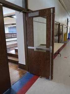 lot 504 image: WOODEN DOOR WITH BULLETPROOF GLASS PANEL