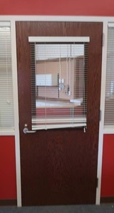 lot 519 image: WOODEN DOOR WITH BULLETPROOF GLASS