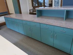 lot 573 image: LONG COUNTER TOP WITH CABINETS AND DRAWERS