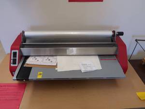 lot 589 image: LAMINEX LAMINATOR, WOODEN TABLE, PAPER CUTTER, STORAGE CABINET