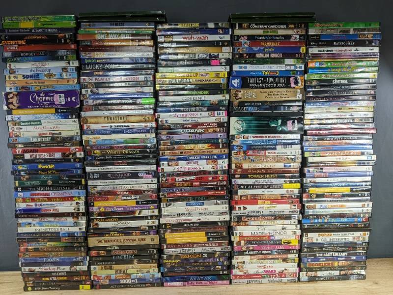 lot 2F image: 248 DVD Collection - Featuring Titles like Charmed, Tombstone, West Side Story, Tower Heist, Hoosiers, Sonic C