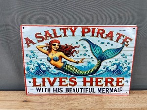 lot 105R image: A Salty Pirate Lives Here with his Beautiful Mermaid 8 x 12 Metal Sign - Brand New
