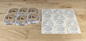 lot 189 image: 7 Nike Skateboarding Palm Tree Stickers & 6 NBA Golden State Warriors Stephen Curry Championship Ring Stickers - New