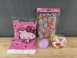 lot 273 image: 2 Hello Kitty Tablecloths 42 x 70 in Pink, Mini Verse Mini Food Ball, 148 Puffy Stickers, Purple Kitty Holder with Kitty - Brand New
