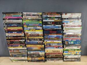 lot 144T image: 141 DVD Movie Collection - Top Gun, Twilight, 21, Star Wars, Hot Tub Time Machine, Jurassic Park, Sixteen Candles C