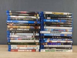 lot 38T image: 34 Blu-Ray Movie Collection - Hunger Games, Life of Pi, Shaun of the Dead, La La Land, Despicable Me, Elf, The Transporter, Planet Earth, The Boss Baby C