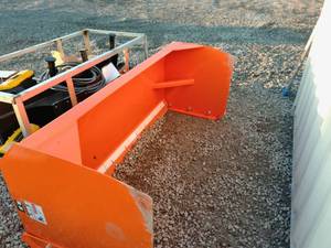 lot 38 image: Wolverine Snow Pusher