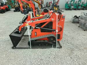 lot 35 image: Mini Skid Steer Loader orange