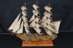 lot 205 image: HMS Bounty Model Ship - Handcrafted Wooden Display Model