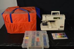 lot 212 image: Bernette 500 Sewing Machine by Bernina with Carry Bag & 24-Spool Sewing Thread Set