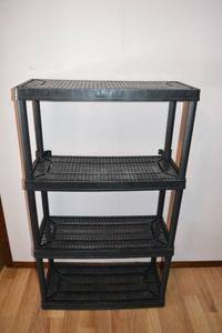 lot 223 image: 4-Tier Black Plastic Shelving Unit - Grid Shelves, Light-Duty Storage