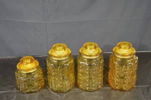 lot 228 image: Amber Glass Apothecary Jars with Lids - Set of 4 Vintage Patterned Jars