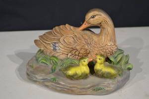 lot 255 image: Duck Figurine - Mother Duck With Two Ducklings On Rock Base