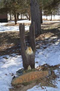 lot 388 image: Wooden Eagle Welcome Sign Totem with Carved Wings - Outdoor Yard Decor