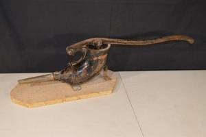 lot 104 image: Antique Cast Iron Sausage Stuffer