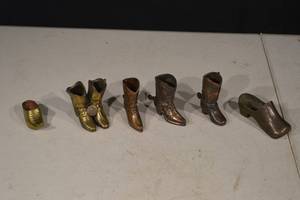 lot 149 image: Miniature Metal Cowboy Boots (Lot of 7)