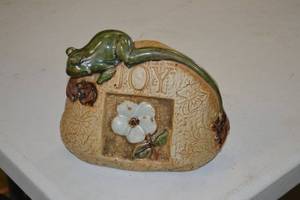 lot 187 image: Green Frog Ceramic Figurine on Textured Beige Base with JOY Inscription