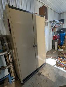 lot 75 image: Storage Cabinet - Beige 2-Door Steel, On Casters