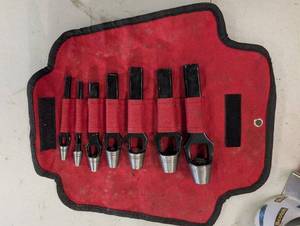 lot 157 image: Jonol 7pc Arch Punch Set Leather Punch Tools in Red Roll Case