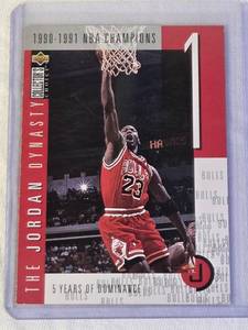 lot 21 image: Michael Jordan 1997 Upper Deck Collectors Choice The Jordan Dynasty #JD1 and Numbered 549123000 - Chicago Bulls Basketball Card