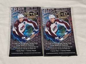 lot 69 image: Lot of 2 Unopened Packs of 2022-23 Skybox Metal Universe Hockey Cards