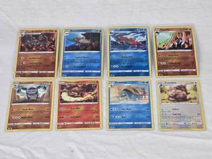 lot 81 image: Lot of 8 Holo Pokemon Trading Cards Featuring Arcanine, Barraskewda, Basculegion, Gigalith, Seismitoad, Turtonator, Drednaw, and Greedentnd Greedent Holo