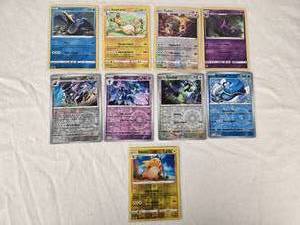 lot 122 image: Lot of 9 Pokemon Holo Cards Featuring Raichu, Ceruledge, and Ampharos