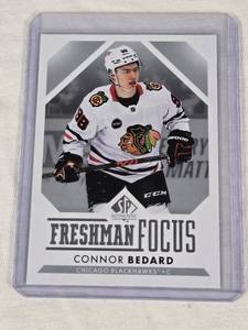 lot 500 image: Connor Bedard Rookie 2023-24 SP Authentic Freshman Focus #FF-1 - Chicago Blackhawks Hockey Card