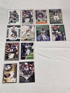 lot 197 image: Lot of 12 Randy Moss Football Cards Including Topps and Donruss with Various Teams and Special Features