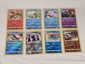 lot 202 image: Lot of 8 Holo Pokemon Cards Including Flareon, Politoed, and Metagross