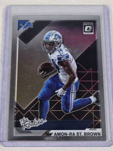 lot 242 image: Amon-Ra St. Brown Rookie 2021 Panini Donruss Optic #TR-17 - Detroit Lions Football Card