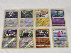 lot 276 image: Lot of 8 Pokemon Holo Cards Featuring Kangaskhan, Oranguru, Tapu Koko, Dhelmise, Stoutland, Bewear, Torterra, and Lickilicky