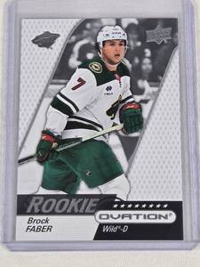 lot 293 image: Brock Faber Rookie 2023-24 Upper Deck Ovation #102 - Minnesota Wild Hockey Card